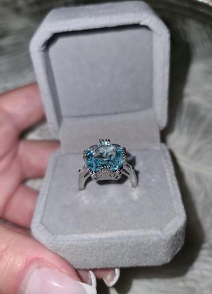 Кольцо со светло-голубым камнем.6 фото