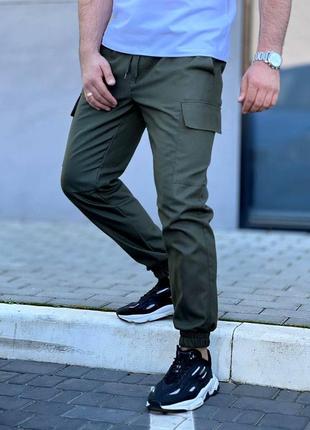 Мужские брюки карго базовые брюки с накладными карманами и резинкой спортивные черные бежевые серые хаки7 фото