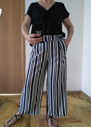 Стильные штаны кюлоты с карманами. размер 143 фото