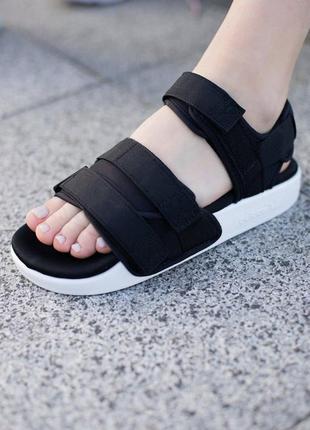 Сандалі adidas adilette sandals чорні з білою підошвою жіночі / чоловічі1 фото