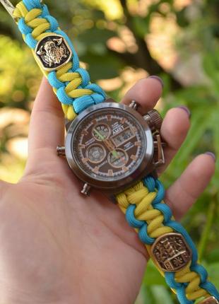 Годинник із козаком гербом україни з латуні з рунами з паракорду + брелок у подарунок5 фото