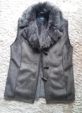 Жилетка