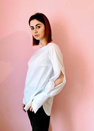 Жіноча біла бавовняна блуза10 фото