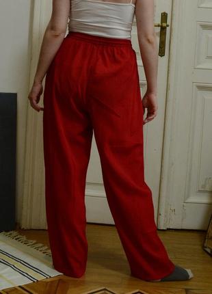 Красные брюки с карманами2 фото