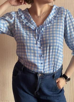 Блуза в клітинку