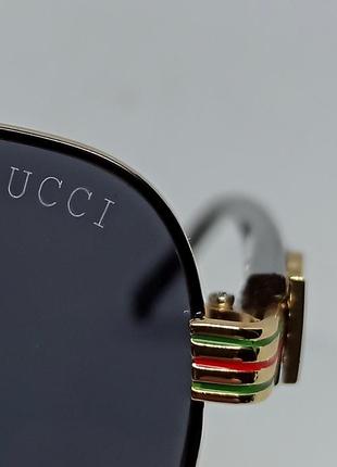 Окуляри в стилі gucci чоловічі сонцезахисні каплі чорні однотонні в золотому металі9 фото