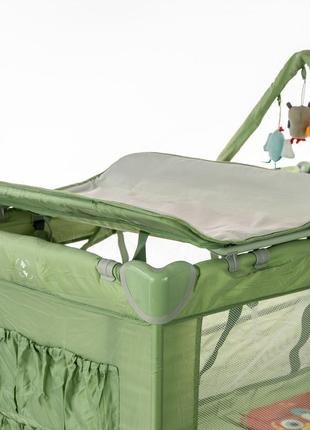 Дитячий манеж - ліжечко пеленатор carrello molto crl-11604 cameo green червоний монстрик6 фото
