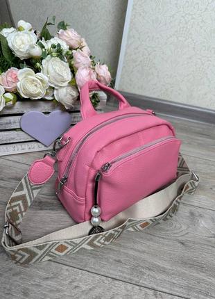 Стильная яркая лаконичная розовая сумочка3 фото