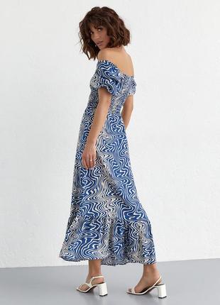 Жіноча довга синя сукня в квіточку з еластичним поясом2 фото