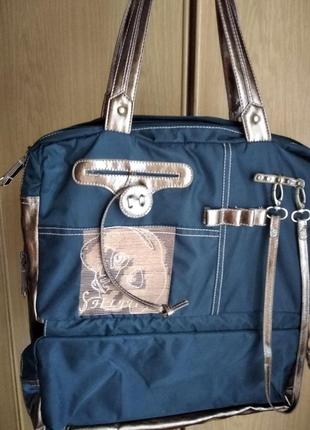 Дорожная женская сумка