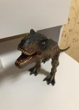 Резиновый динозавр игрушка2 фото