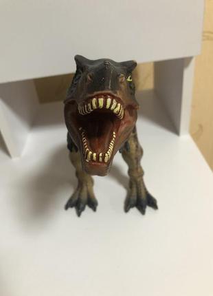 Резиновый динозавр игрушка8 фото