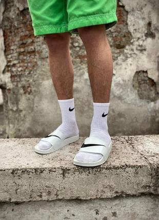 Чоловічі шльопанці nike white black logo7 фото