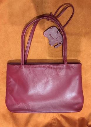 Стильна шкіряна рожева маленька сумка1 фото