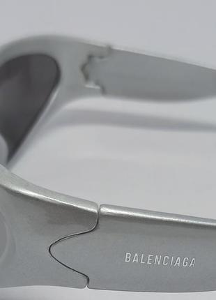 Очки в стиле balenciaga женские солнцезащитные модные обтекаемые футуристические серые зеркальные5 фото
