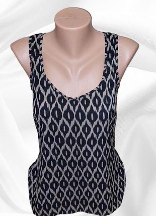 Тоненька футболка 44 розміру