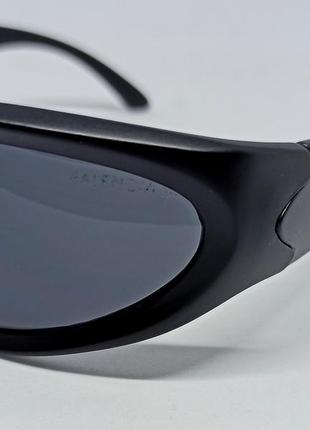 Очки в стиле balenciaga солнцезащитные унисекс модные обтекаемые футуристические черные3 фото