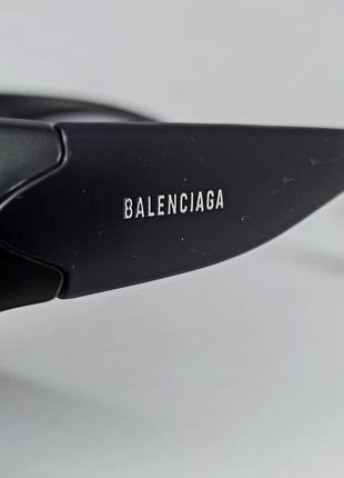 Очки в стиле balenciaga солнцезащитные унисекс модные обтекаемые футуристические черные9 фото