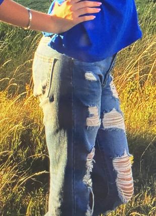 Джинси світло- сині ana&lucy 36 розміру рвані , мами6 фото