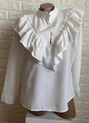 Нарядна біла блуза 42-44р1 фото