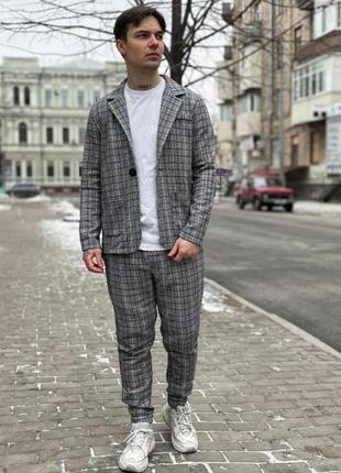 Костюм мужской серый в клетку брюки + пиджак деловой/классический2 фото