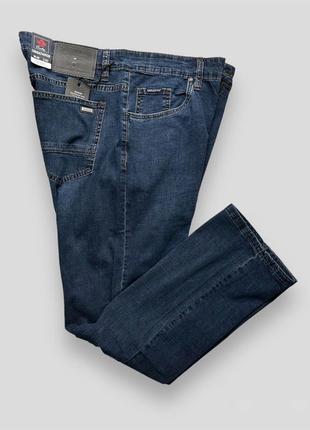 Тонкие мужские джинсы больших размеров7 фото