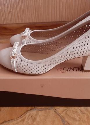 Продам білі шкіряні туфлі фірма cantarini5 фото