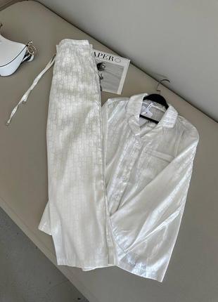Костюм атлас в стиле dior в пижамном стиле рубашка брюки клеш палаццо белый2 фото