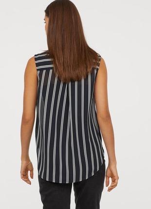Полосата блузка-сорочка, розмір 36,с нова з бірками, внизу маленькі розрізи по боках3 фото