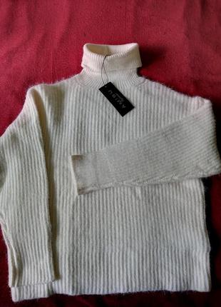 Женский свитер свободного кроя.1 фото