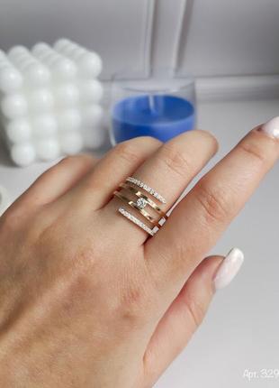 Серебряное кольцо  с золотыми накладками и камнями2 фото