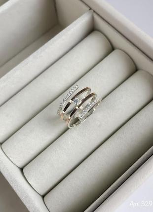 Серебряное кольцо  с золотыми накладками и камнями3 фото