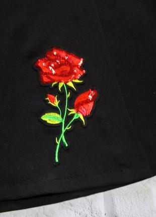 Спідниця для дівчаток чорна на запах "троянда" р 152-1583 фото