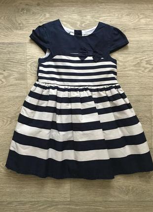 Стильное платье в полоску с бантиком