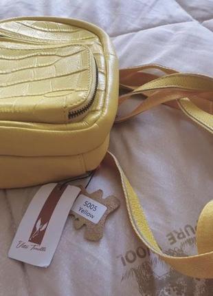 Жовтий шкіряний рюкзак2 фото