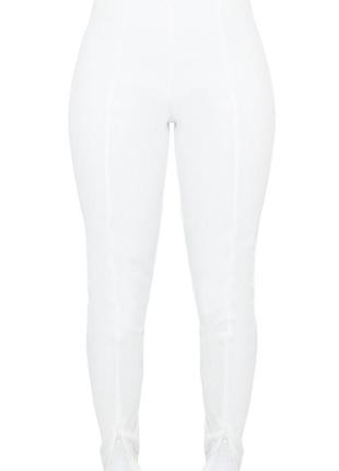 Белые брюки с разрезами снизу в рубчик с высокой посадкой талией2 фото