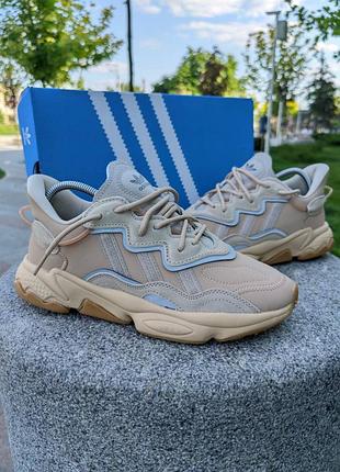 Шкіряні чоловічі  кросівки adidas ozweego. колір бежевий.