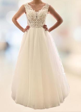 Продам весільну сукню . колір - айворі . повністю нова !!!  не одягнена жодного разу1 фото