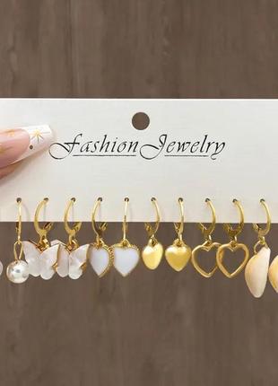 Набір жіночих золотих сережок з нержавіючої сталі кульчики у формі метелика, серця, ракушки, геометричні сережки2 фото