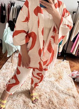 Костюм с накидкой и брюками2 фото