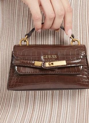 Сумка guess enisa micro mini - crossbody bag — цена 1600 грн в каталоге  Кросс-боди ✓ Купить аксессуары по доступной цене на Шафе | Украина  #123968388