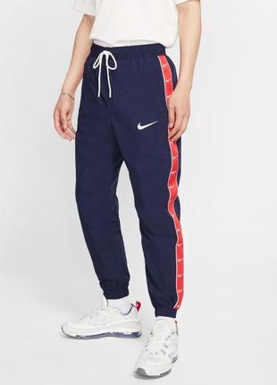 Спортивные штаны nike taped swoosh woven pant cd0421-451. оригинал2 фото