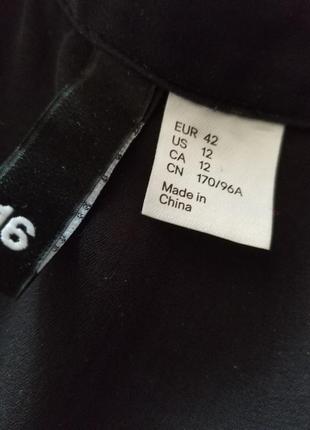 Двухцветная бежево-черная удлиненная блуза3 фото