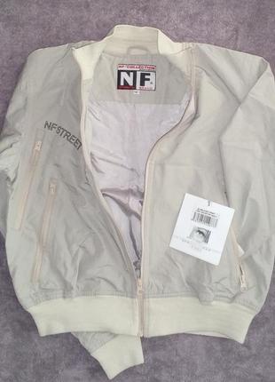 Нова куртка бомбер, ветровка. марка nf collection2 фото