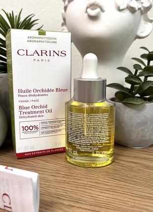 Оригінал масло для обличчя для зневодненої шкіри clarins blue orchid face treatment oil оригинал масло для лица2 фото