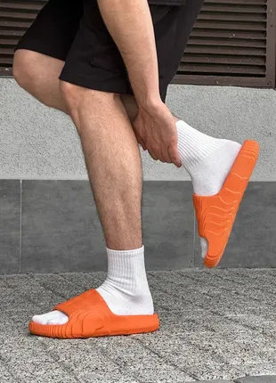 Стильні  молодіжні чоловічі шльопанці помаранчевого кольору з якісної піни/взуття на літо/ п8 фото