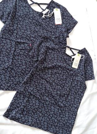 Футболки з розрізом на спині