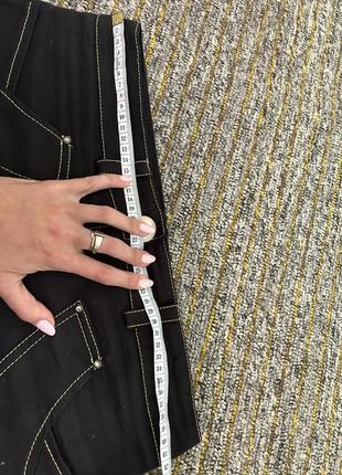 Черная мини юбка джинсовая с карманами трапеция м3 фото