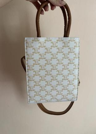 Бежева сумка в стилі celine з довгою ручкою та написом3 фото