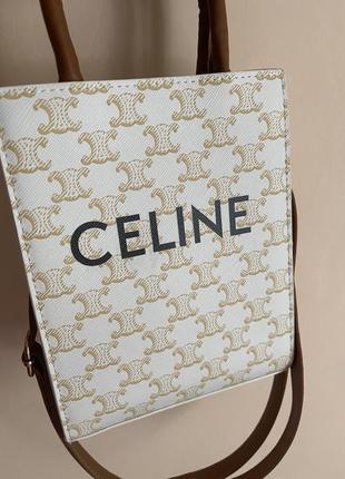 Бежева сумка в стилі celine з довгою ручкою та написом6 фото
